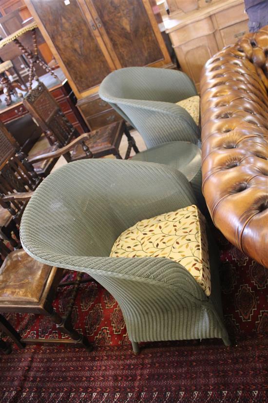 Pair of Lloyd Loom chairs and a coffee table